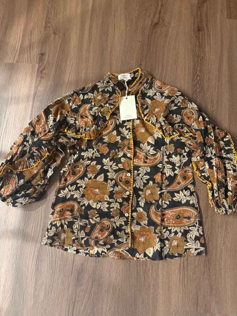 Chasing Unicorns Black Floral Top with Mustard Crochet Trim
